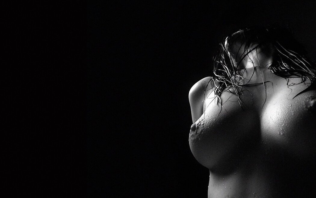 Naked Girls On A Dark Background