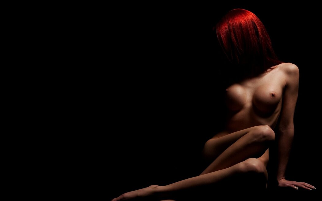Naked Girls On A Dark Background