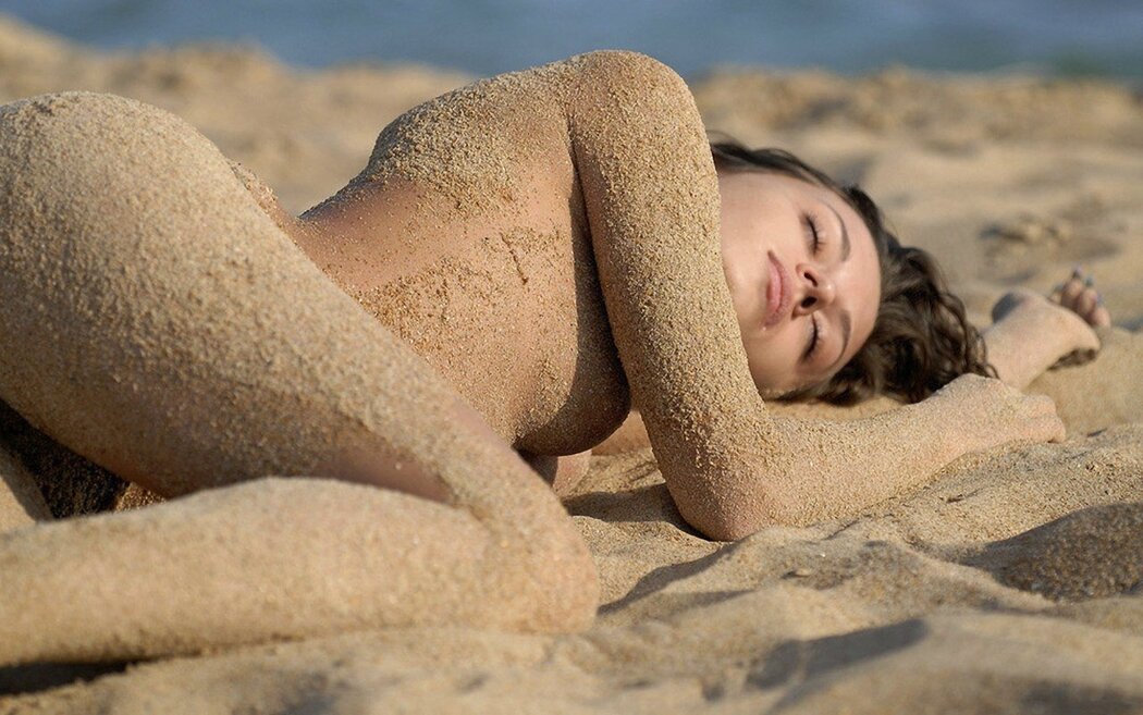 Naked Girl On The Sand