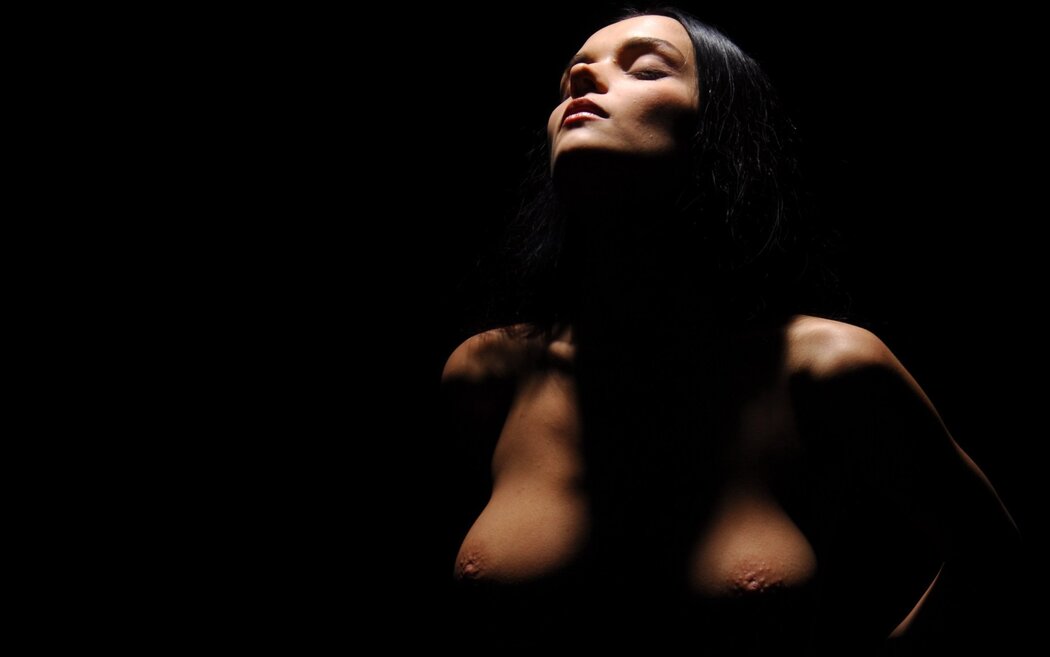 Naked Girls On A Dark Background