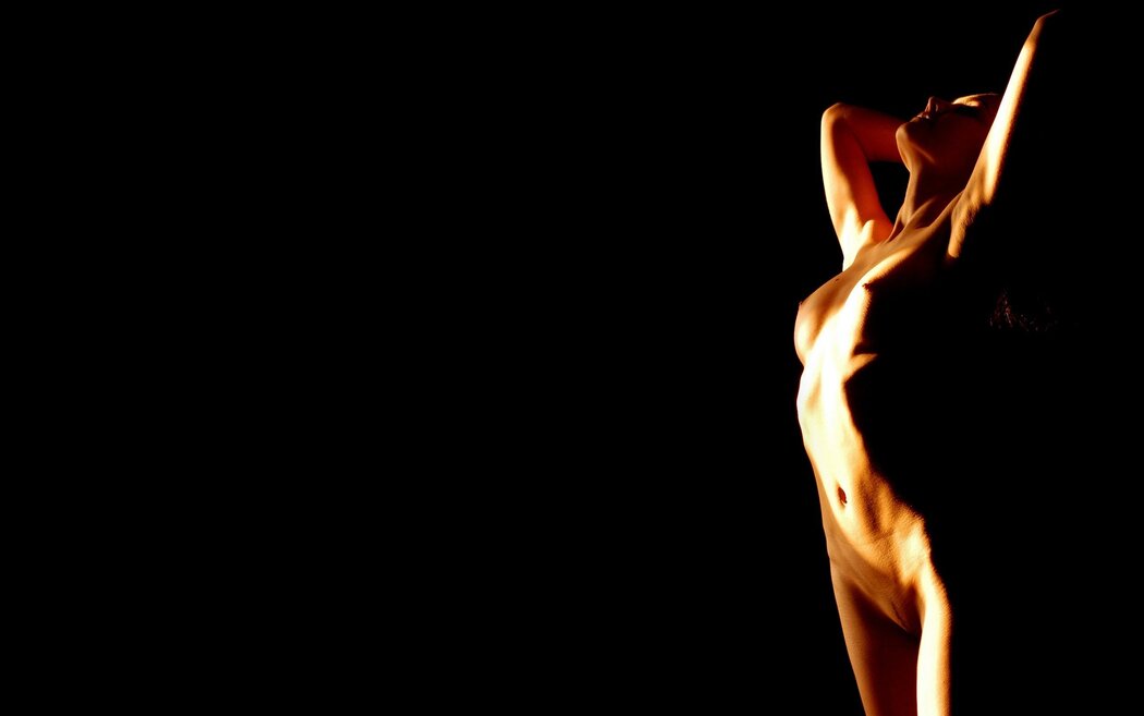 Naked Girls On A Dark Background