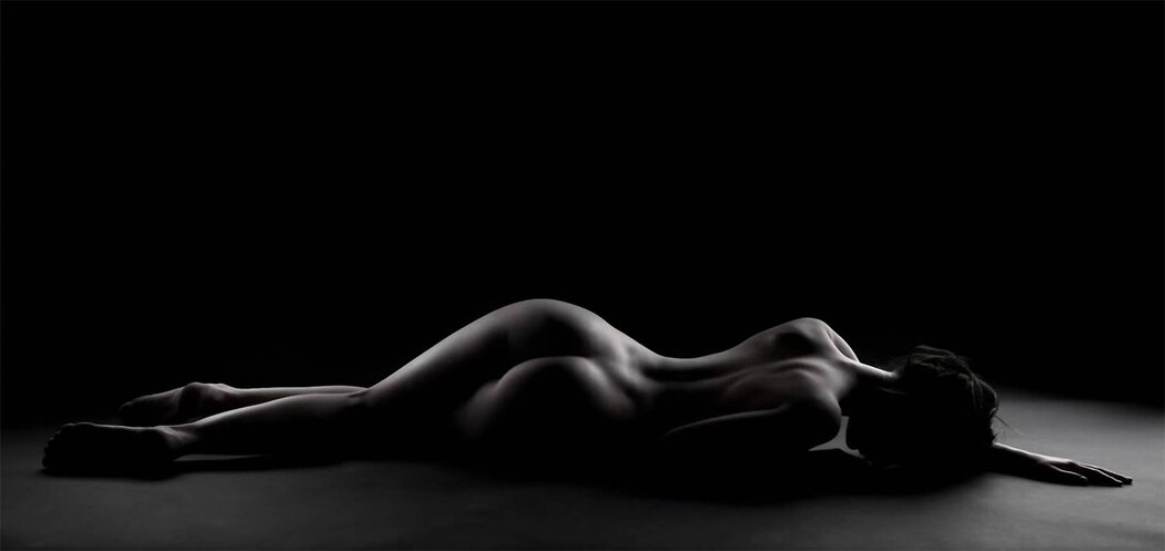 Naked Girls On A Dark Background
