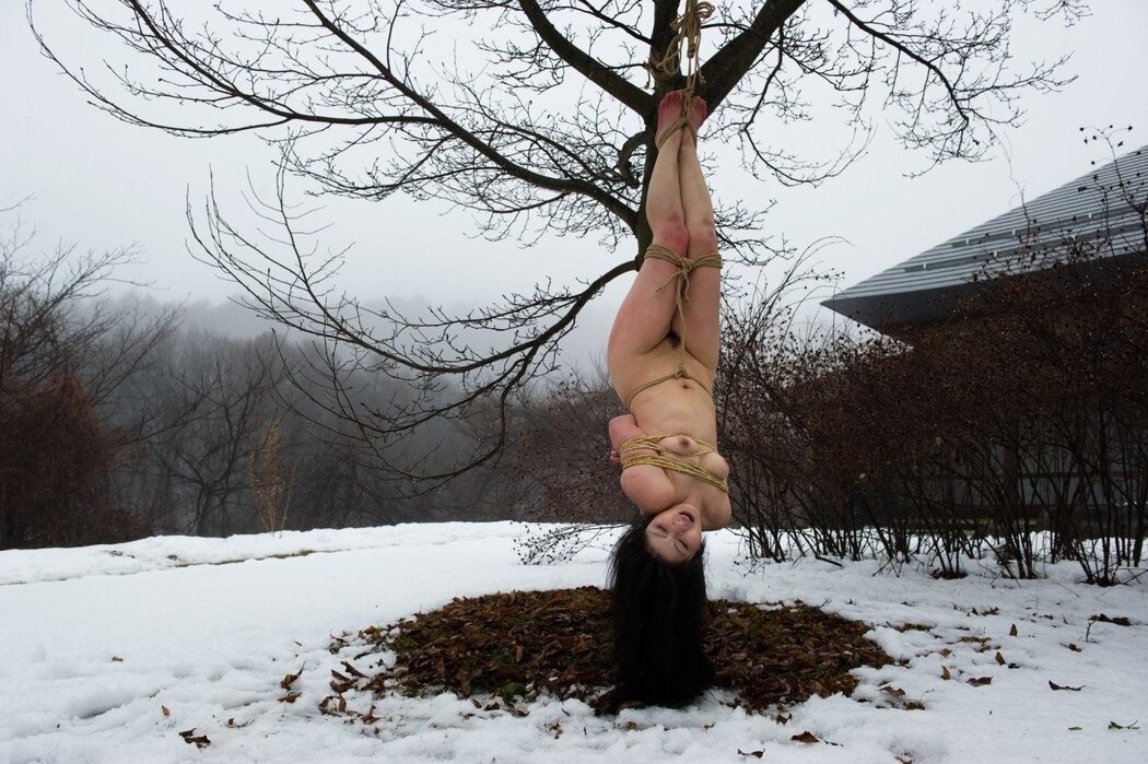 Nude Girl Hanging Upside Down