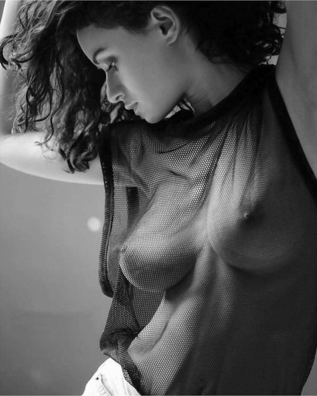 TITS UNDER HER SHIRT