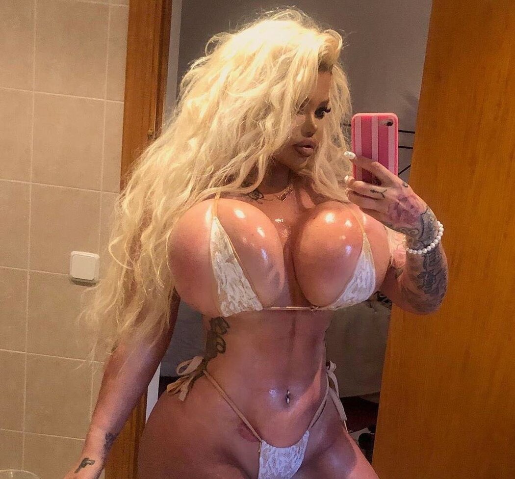 SILICONE TITS IN PORN