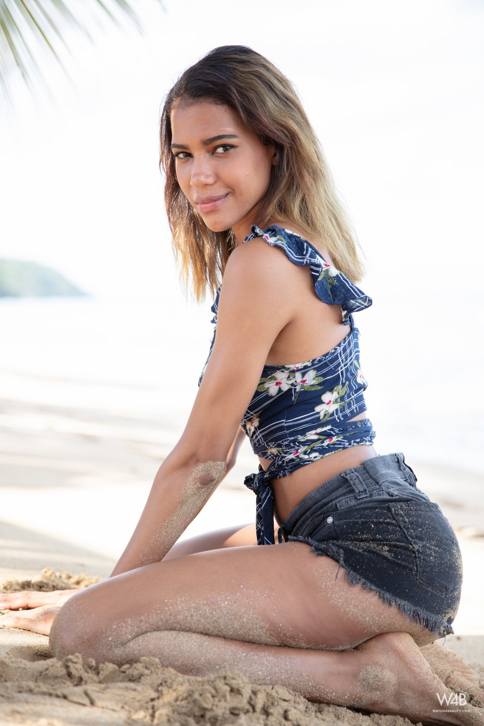 Abril Posing Naked On The Beach