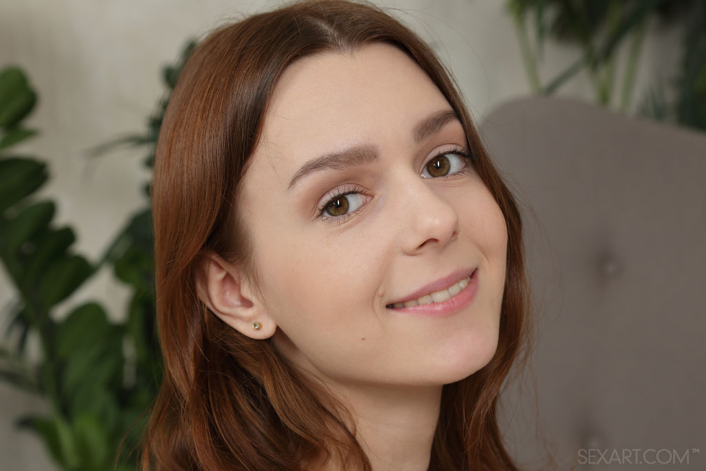 Amber Plume Stroking And Spreading Her Shaved Pussy