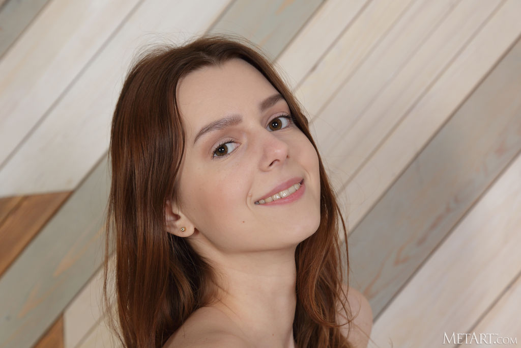 Amber Plume Tugs Her Panties Aside For A Glimpse Of Her Shaved Pussy