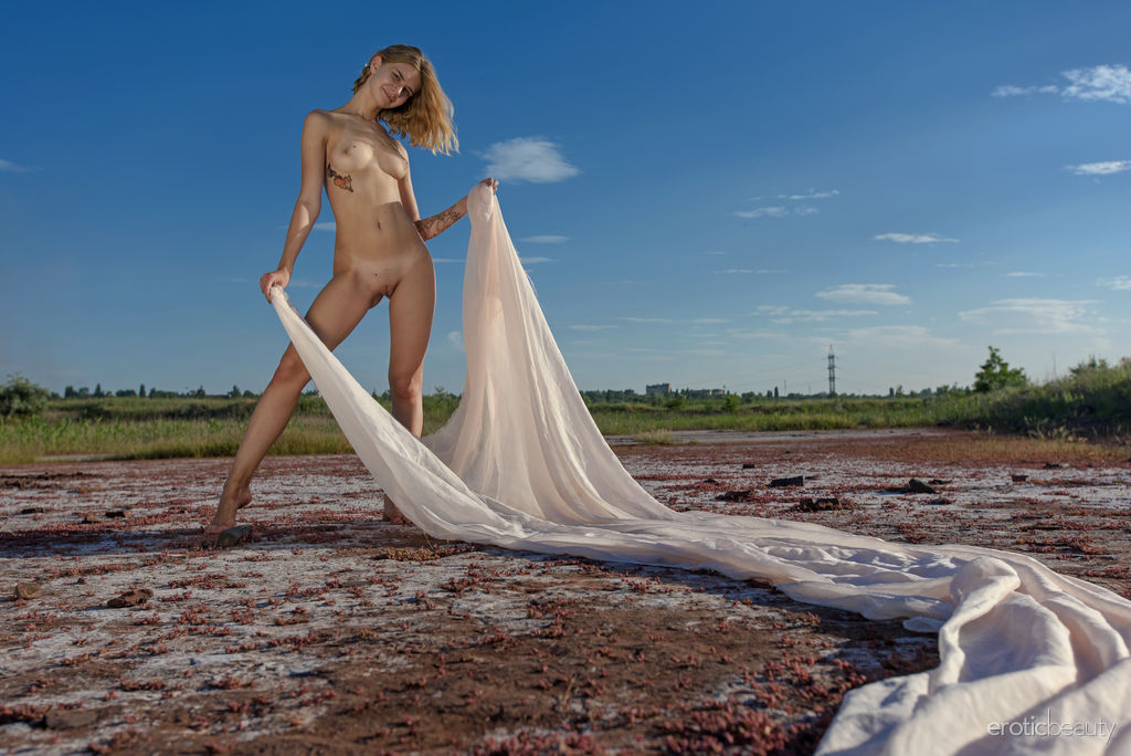 Artemida Strips Nude At The Beach