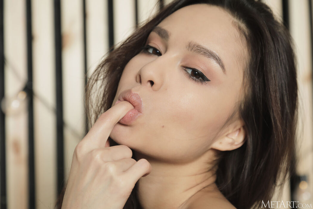 Astrid Herrara Strips And Squeezing Her Curvy Ass Cheeks