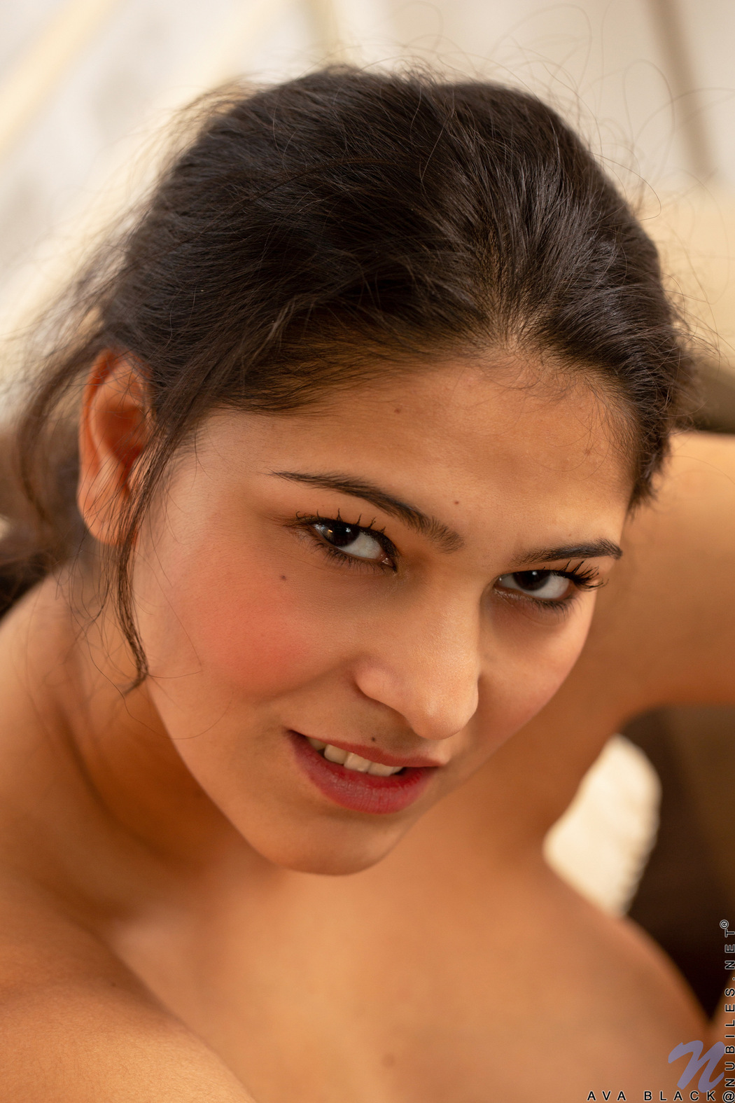 Busty Ava Black Gets Herself Naked