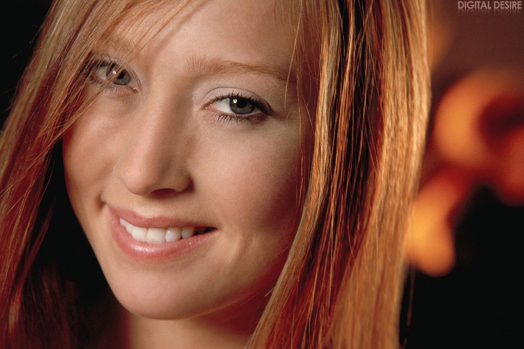 Dana Brunette Poses By The Fireplace