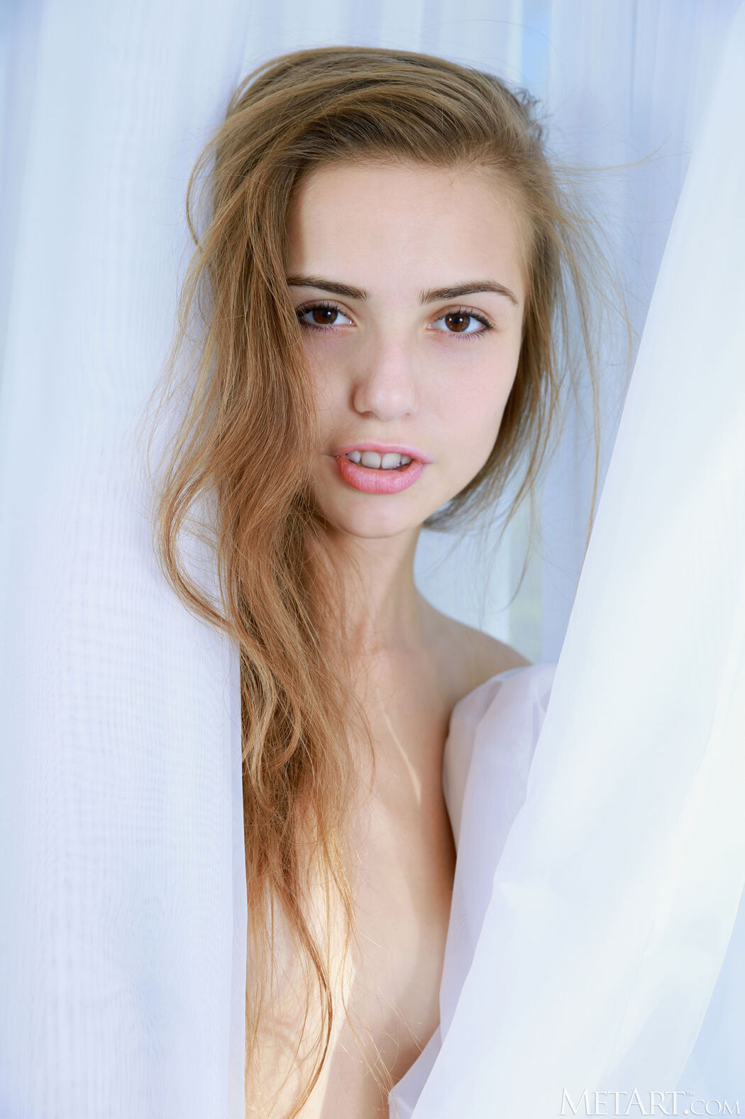 Elle Tan Makes Delicious Rear View Of Her Shaved Pussy And Perfect Ass