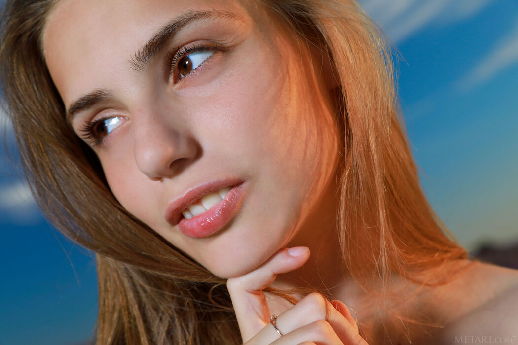 Elle Tan Shows Perfect Breasts And Shaved Pussy