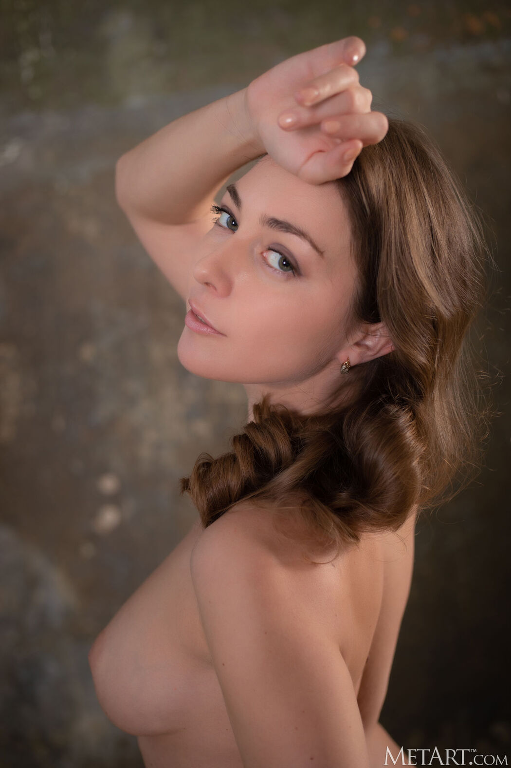 Emerald Ocean Exposing The Prominent Folds Of Her Shaved Pussy