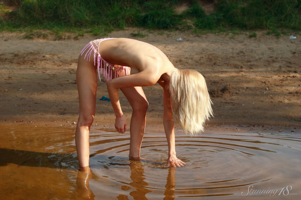 Gara Blonde Babe Strips Outdoors