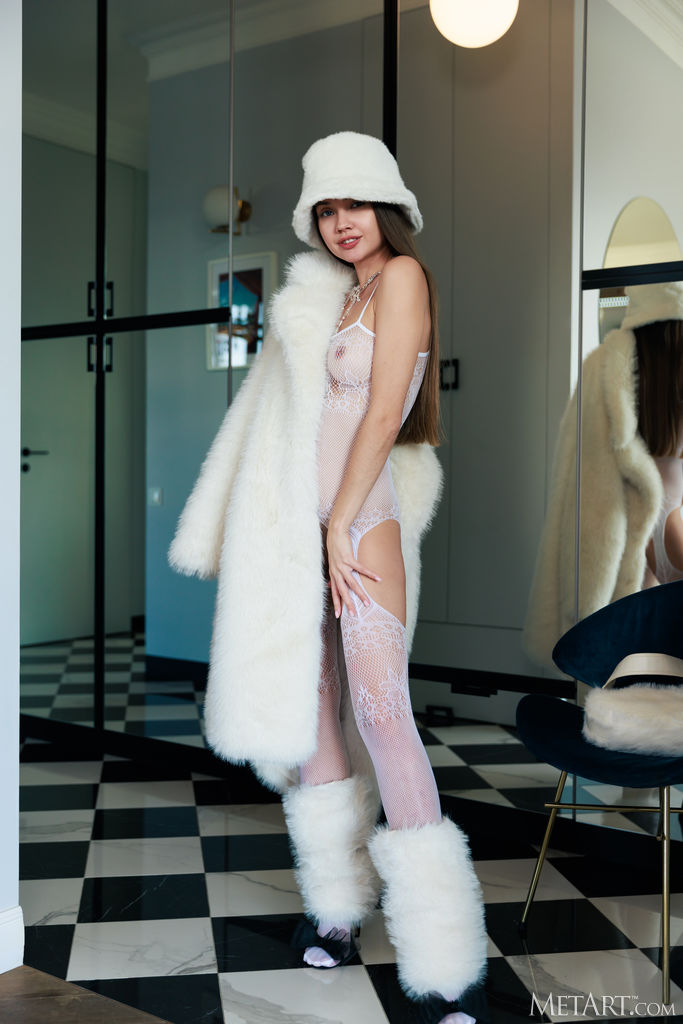 Georgia Gorgeous Blue Eyes Sparkle Flirtatiously As She Lets Her Coat Fall Open To Reveal Her Perfect Body
