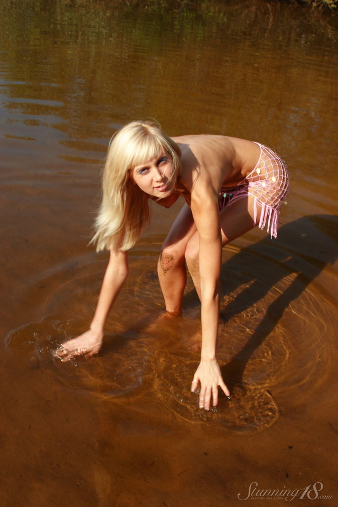 Gara Blonde Babe Strips Outdoors