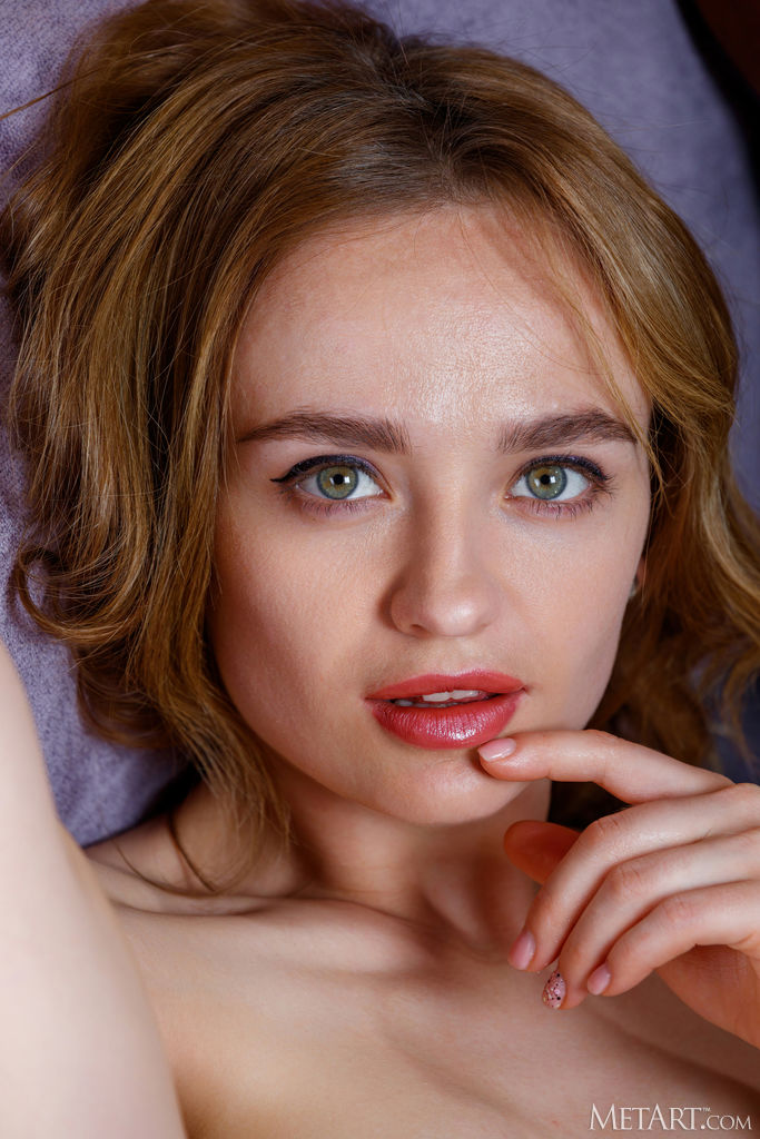 Gorgeous Redhead Felice Shimmies Out Of Her Shorts For An Intimate View