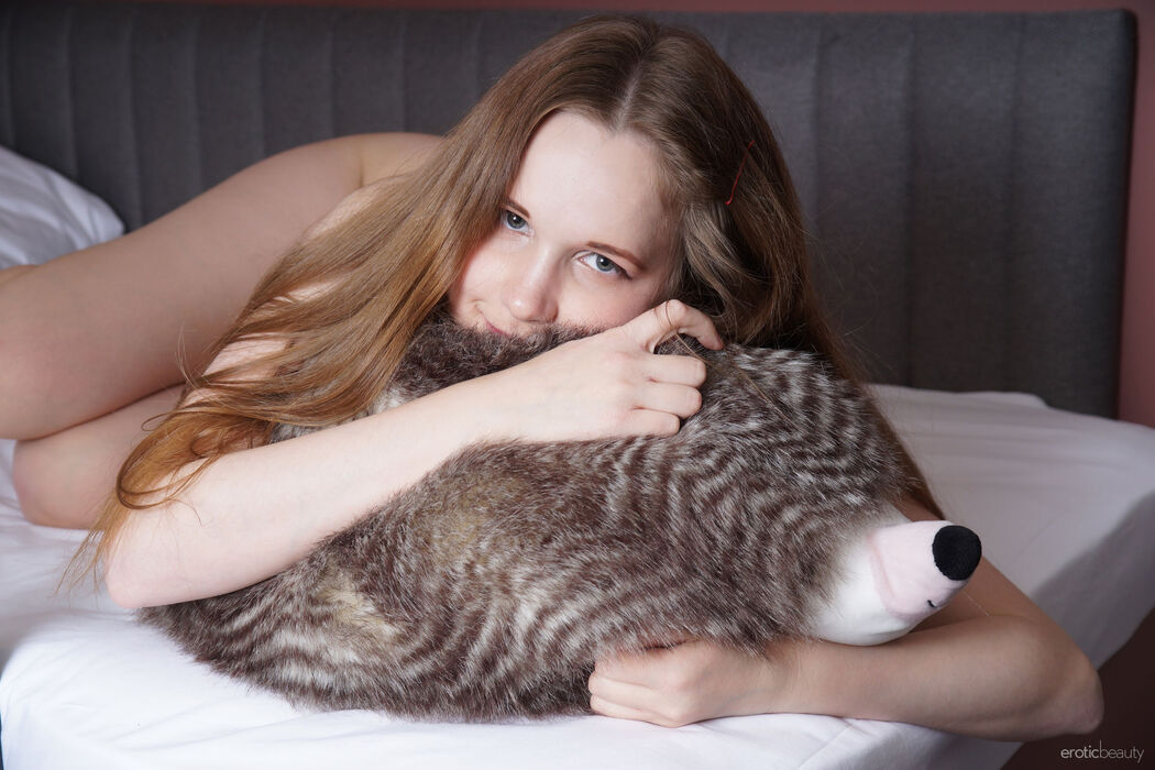 Hottie Alice N Strips And Shows Her Hairy Pussy