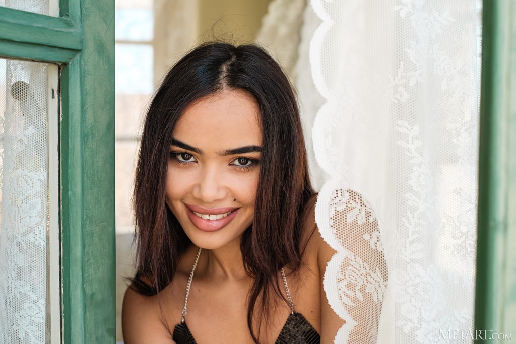 Isa Sweet Exposing Her Shaved Pussy With A Smile