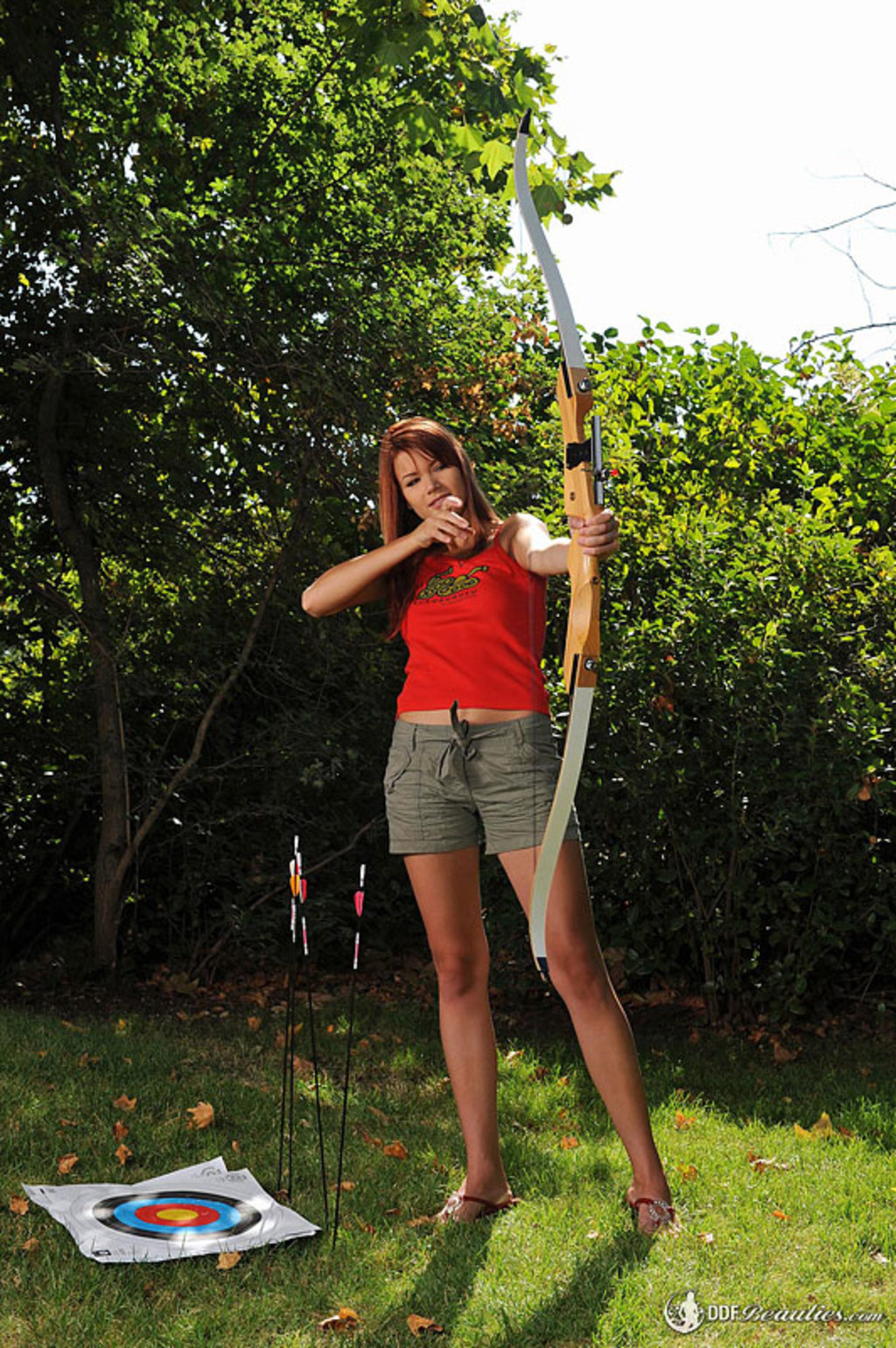 Kami Practices Archery And Nudity Cover Photo