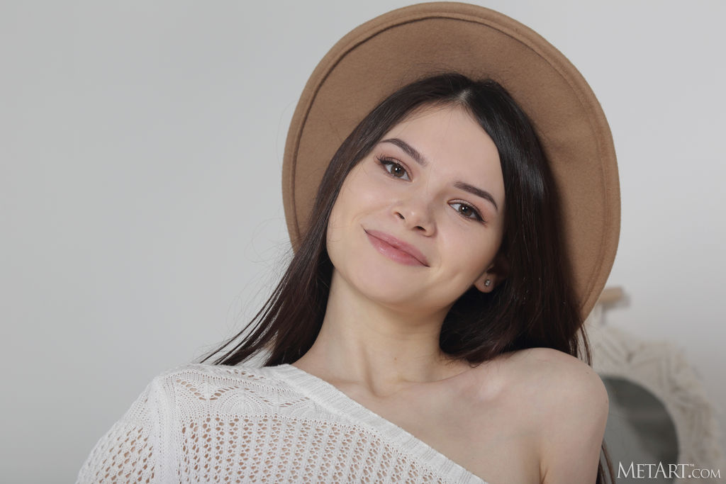 Kinsley Revealing The Moist Pink Folds Of Her Bare Pussy