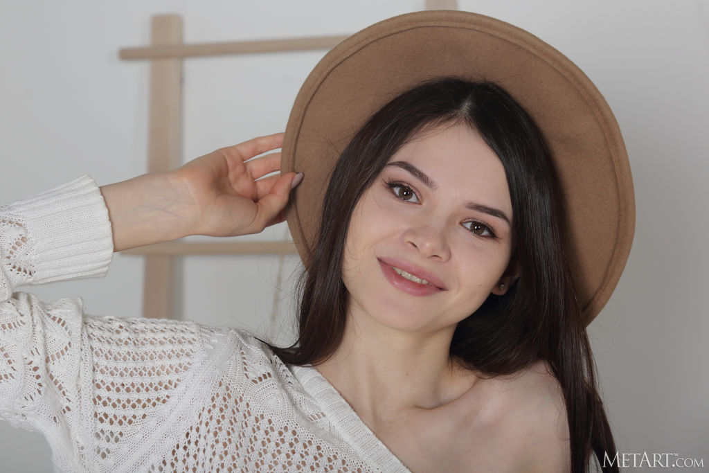 Kinsley Revealing The Moist Pink Folds Of Her Bare Pussy