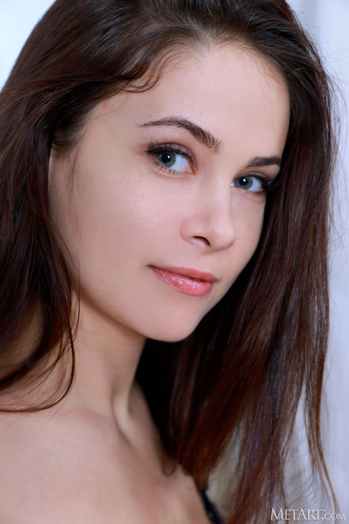 Martina Mink Parting Her Thighs To Frame Her Shaved Pussy Invitingly