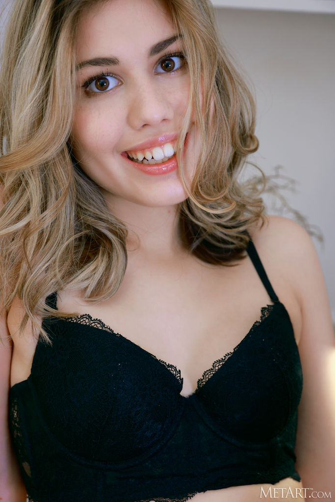 Marta Bella Goes Face Down Ass Up On The Bed