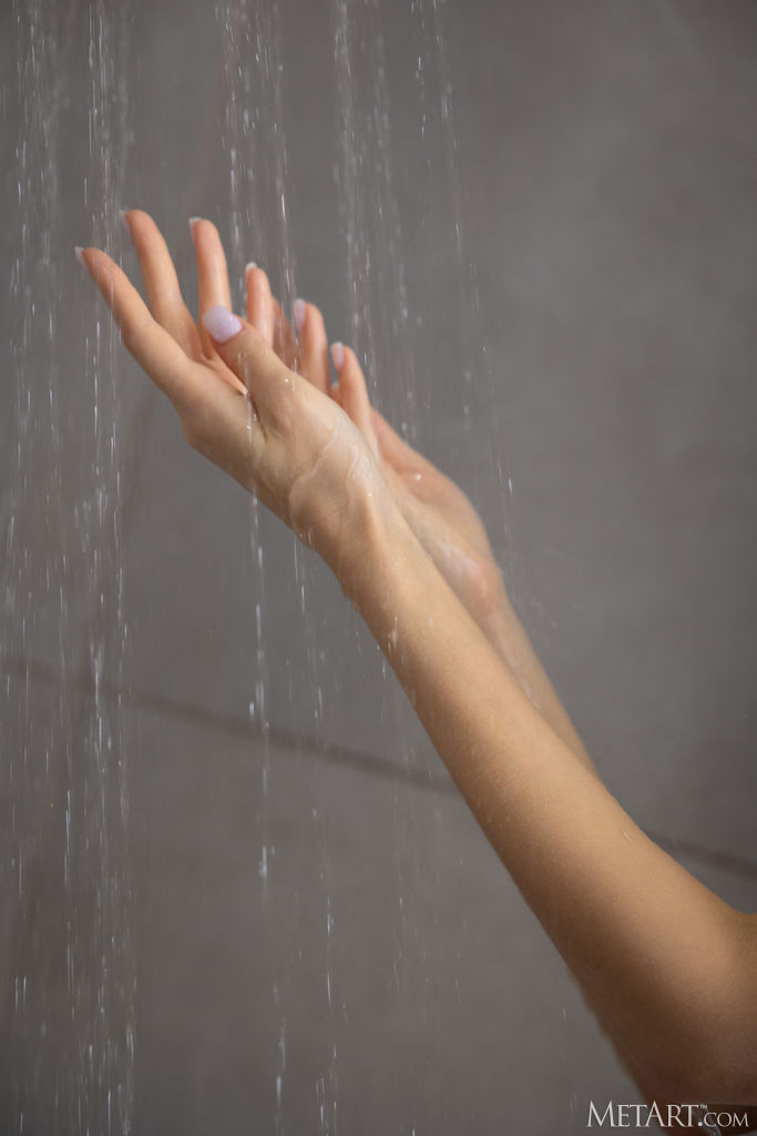 Mercia Francis And Water Cascading Over The Plump Contours Of Her Shaved Pussy