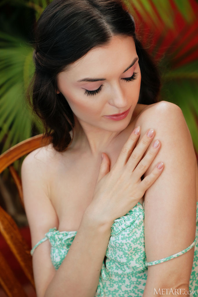 Monika May Parting Her Silky Thighs To Expose Her Shaved Pussy