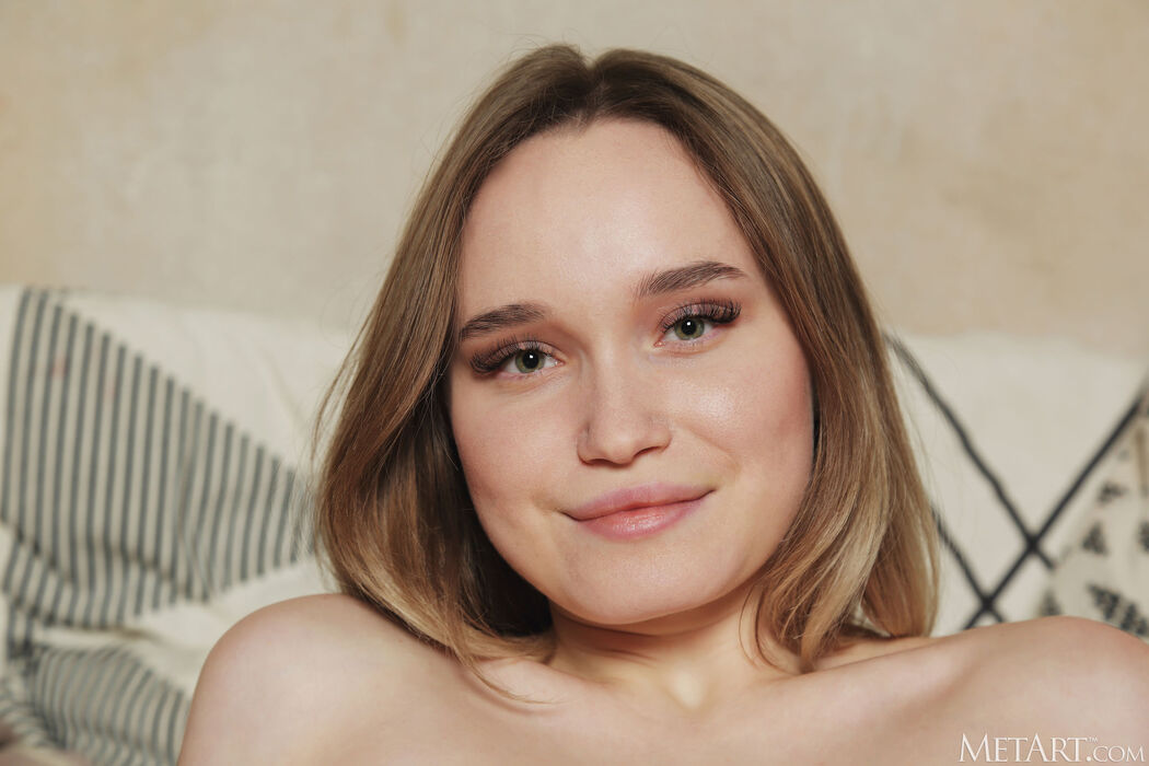 Olivia Myers Thighs Parted To Frame Her Shaved Pussy