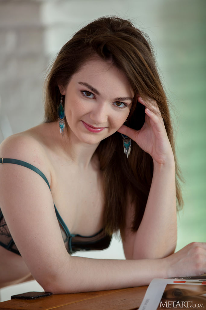 Purr Simona Wearing Nothing But Her High Heels As She Stretches Out On The Table