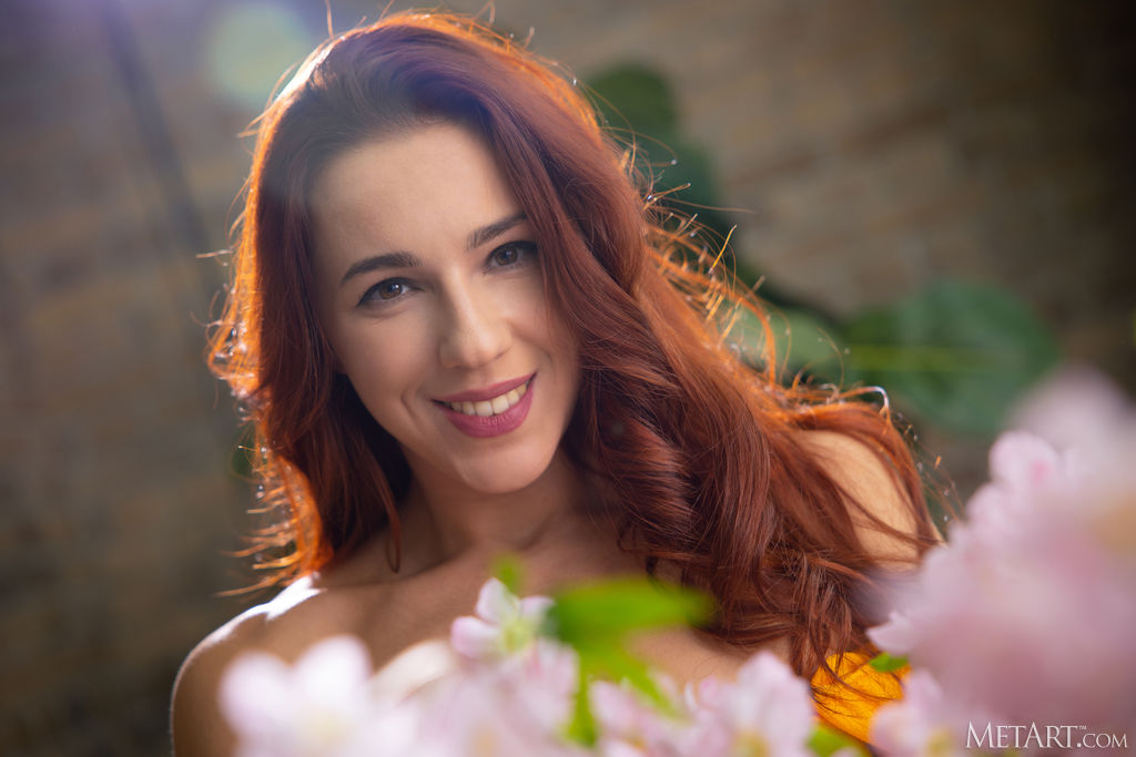 Sexy Redhead Oxi Bendini Kicks Her Long Legs Wide Cover Photo