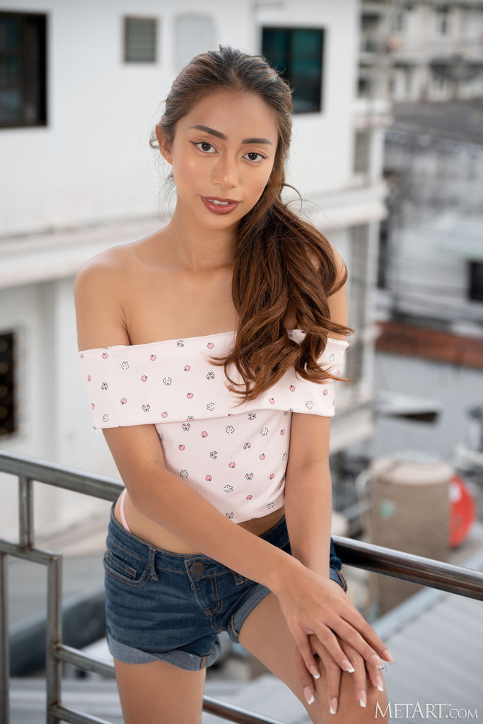 Pixie Topless And Straddling Her Plastic Ride