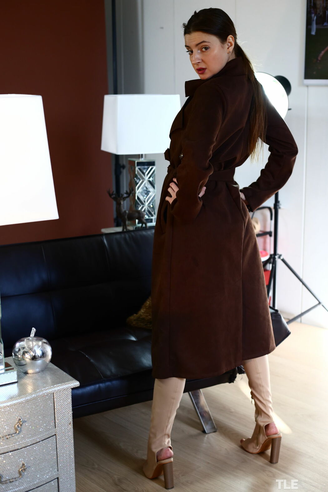 Melena A Teases On Couch With Suspender Belt And Over The Knee Boots Cover Photo