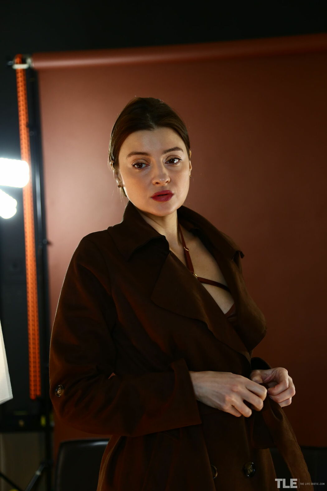 Melena A Teases On Couch With Suspender Belt And Over The Knee Boots