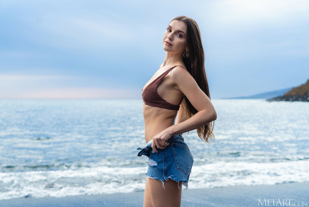 Monika May Siren Squad Strolls Beach In Denim Shorts, Beads Of Water Glisten