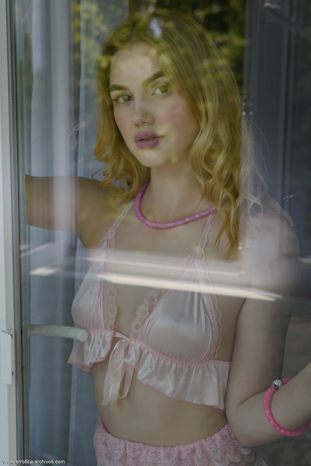 Hannah Lynn Yields In A Sultry Indoor Striptease With Socks And Garter Belt