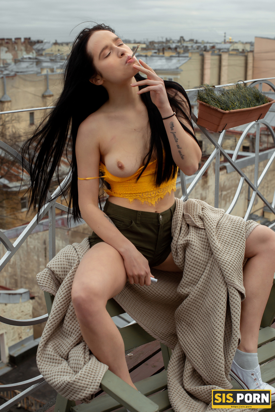 Juicy Leyla Smokes A Cigarette During A Sensual Shower Scene
