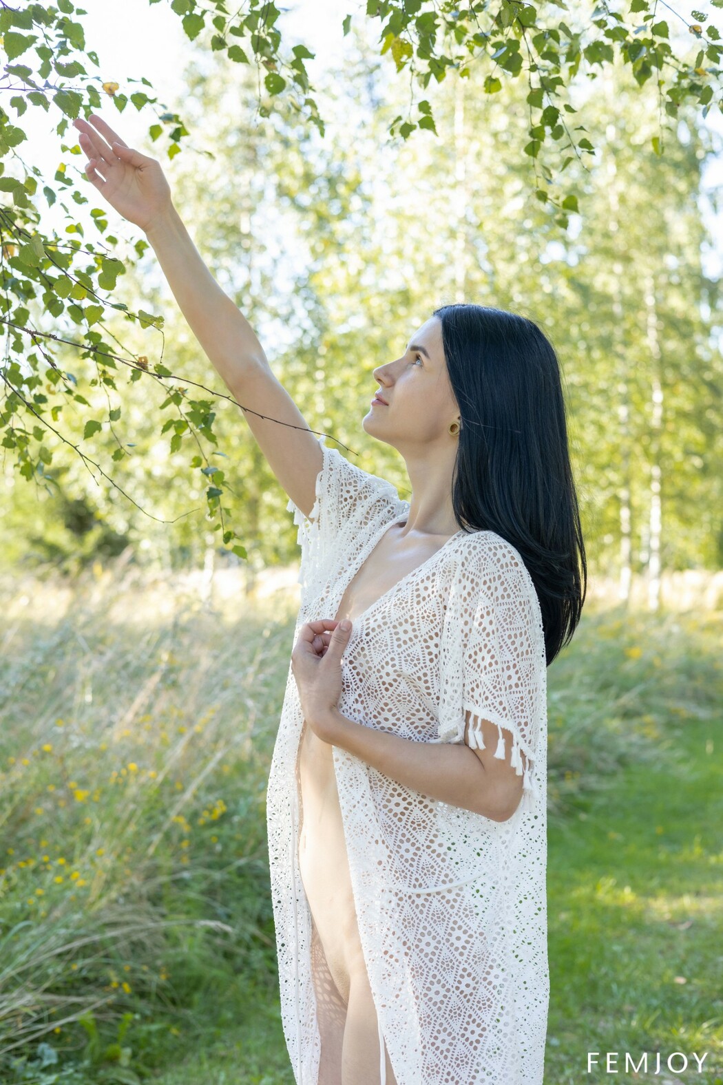 Posy Standing Nude Outdoors By Birch Trees Smiling In Natural Light With Green Grass Around